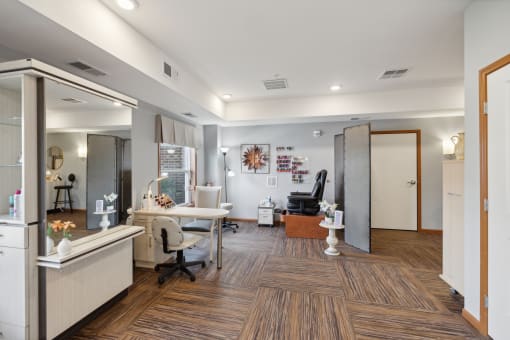 a dentist office with white walls and wood floors