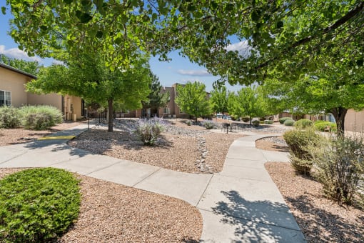 the preserve at ballantyne commons community walkway with trees and plants