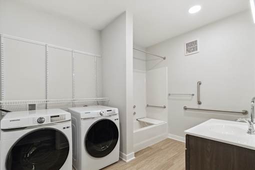 A laundry room with a washer and dryer.