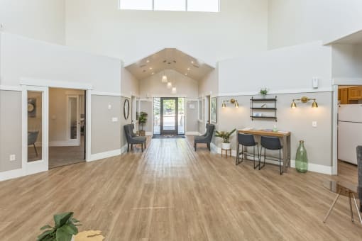 a living room with a dining room and a kitchen
