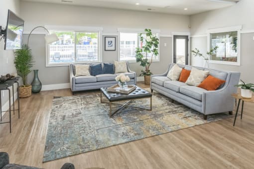a living room with two couches and a coffee table