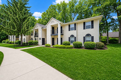 Apartment building exterior with manicured lawn at Northview Park Apartments, Sterling Heights, 48310