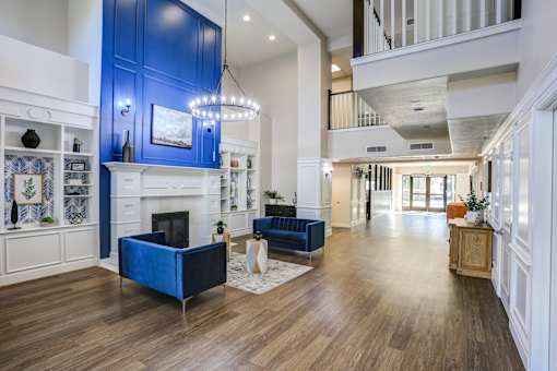 Spacious clubhouse lobby with two story ceiling at The Beckstead Apartments, South Jordan