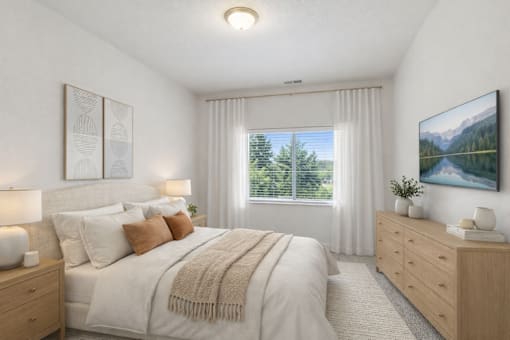 Bright bedroom with neutral decor and natural light at Lake Ridge Apartments, Prior Lake, Minnesota