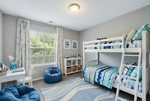 Kids bedroom with bunk beds and study area at Delta Crossing Apartments, Charlotte