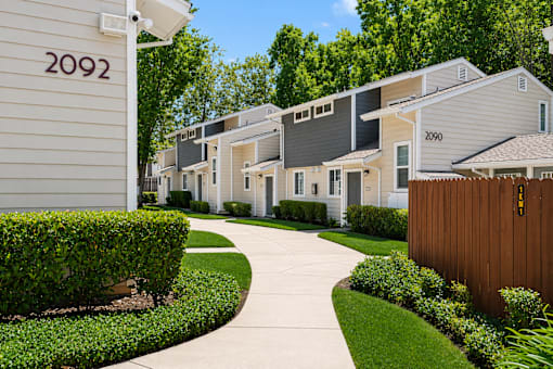 A row of houses numbered 2092 to 2099.