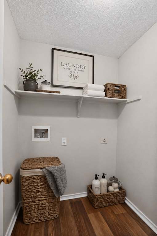 Laundry room with a shelf and a basket.