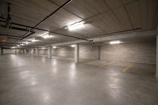 Underground parking garage with concrete construction at The Ponds at Heritage Place Apartments, Sartell, MN 56377
