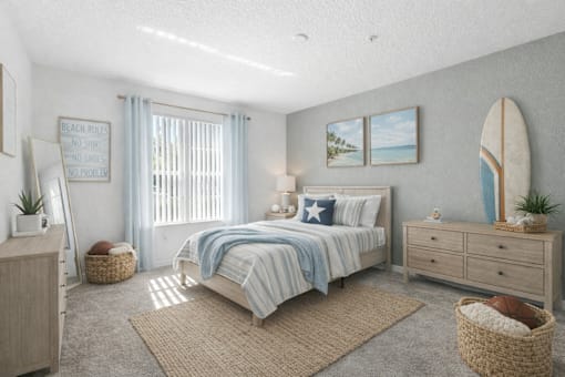A bedroom with a bed, nightstands, and a surfboard on the wall.