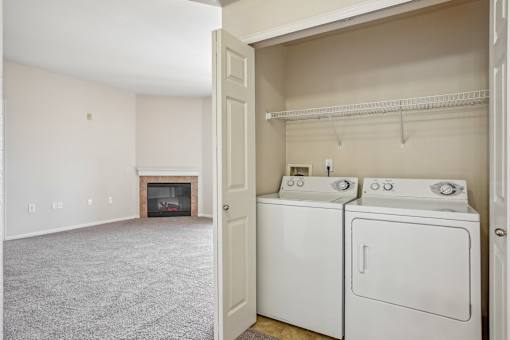 A laundry room with a washer and dryer.