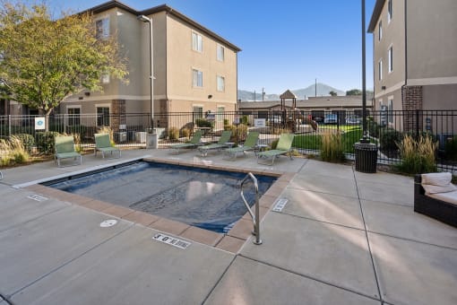 our apartments have a resort style pool with lounge chairs