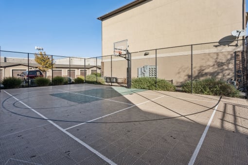 the basketball court at the enclave at university heights apartments ut