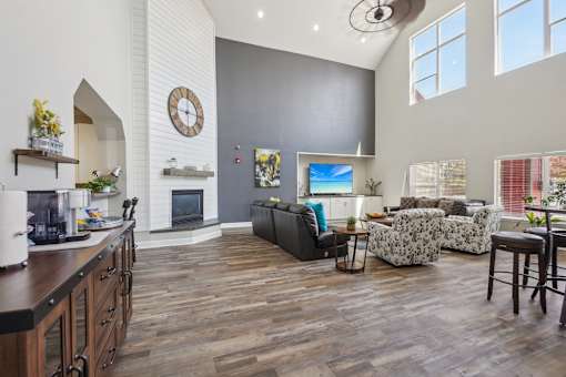 A living room with a fireplace and a couch.