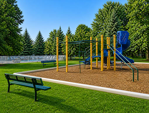 Playground with slide and pool area at Northview Park Apartments, Sterling Heights