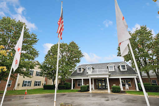 A building with a flag in front of it.