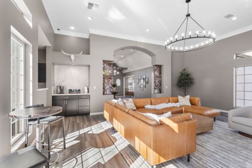 a living room with a couch and a table