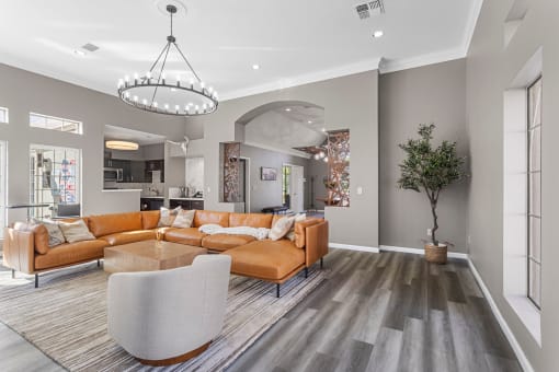 a living room with couches and a table
