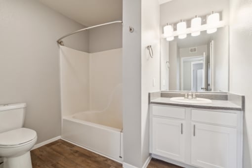 a bathroom with a toilet sink and a shower at Vista Linda, Santa Fe, NM