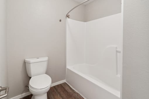 an empty bathroom with a toilet and a shower at Vista Linda, New Mexico