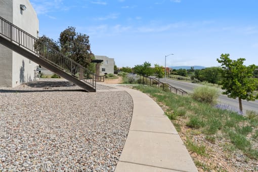 a walkway next to a building and a street at Vista Linda, New Mexico 87507