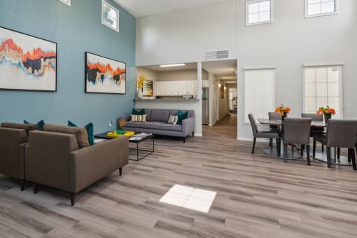 a living room and dining room area with couches and a table and chairs at Vista Linda, Santa Fe