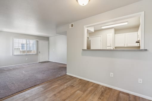 the spacious living room and dining room of an apartment at Vista Linda, New Mexico 87507