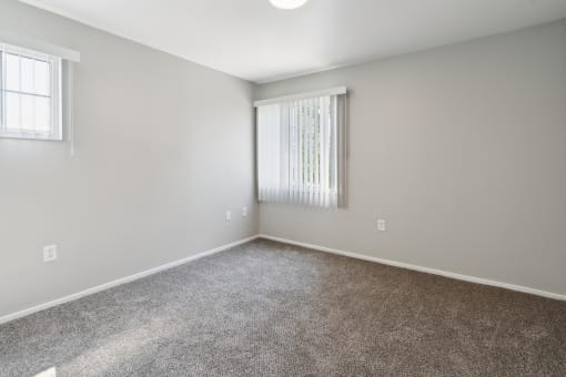an empty room with carpet and a window at Vista Linda, New Mexico 87507