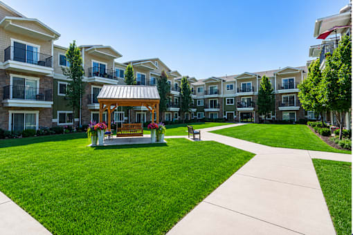 Courtyard with gazebo and walking paths at The Ellison Apartments, Layton, 84041