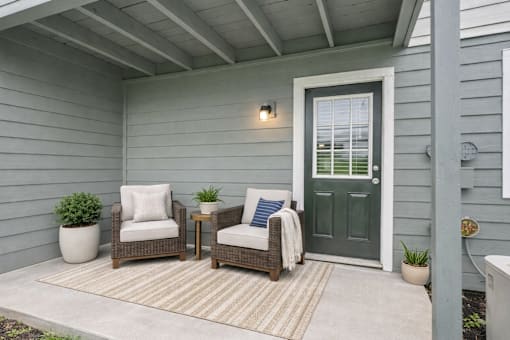 Porch with two chairs at Brookwood, Archdale, NC