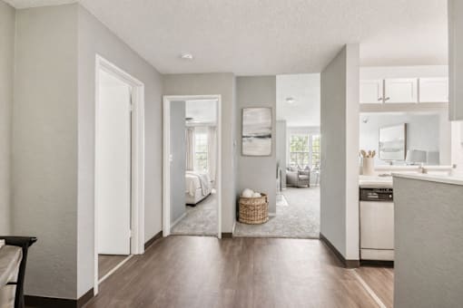 A kitchen area with a dishwasher and a sink.