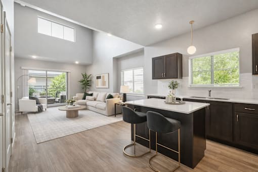 Open concept living room and kitchen at Harper Ridge Apartments, Meridian, ID 83642