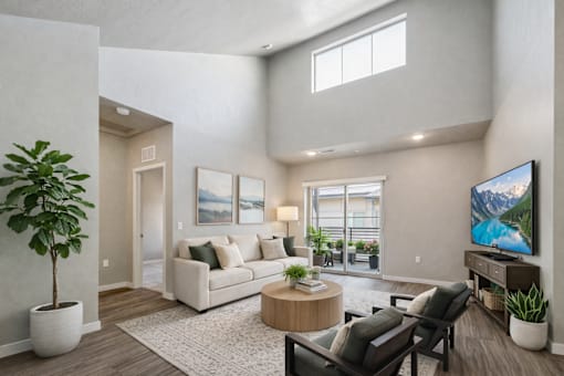 Open concept living room with contemporary furnishings at Harper Ridge Apartments, Meridian, 83642
