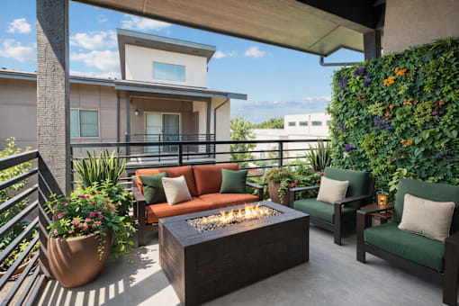 Rooftop patio with fire table and seating at Harper Ridge Apartments, Idaho