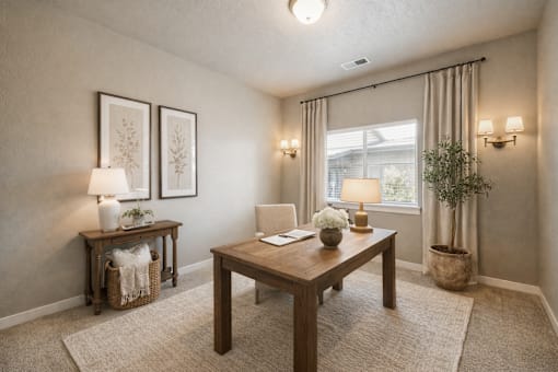 Home office with wood desk and natural light at Harper Ridge Apartments, Idaho, 83642