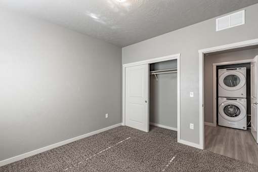 A laundry room with a washer and dryer.