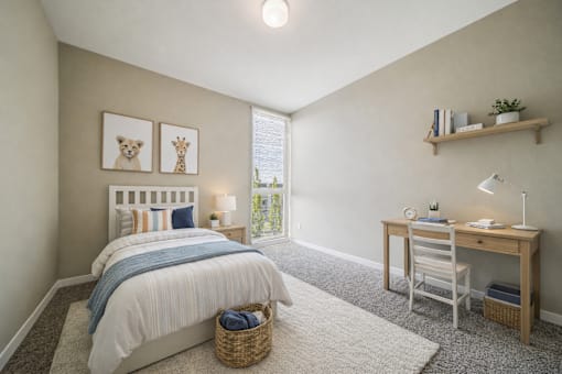 Bedroom with desk and natural light at Lofts at Innovation Center Apartments, Richland, WA 99354
