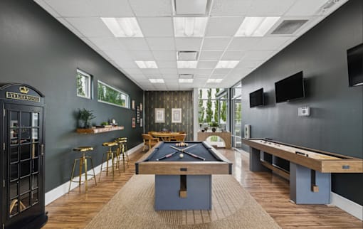 Game room with pool table and shuffleboard at Lofts at Innovation Center Apartments, Richland, 99354