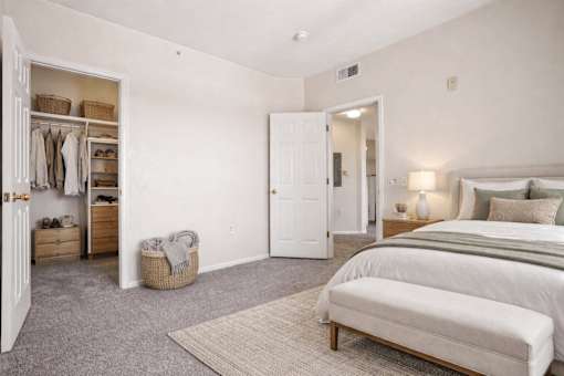 Spacious bedroom with walk-in closet and ensuite bathroom at Stetson Meadows Apartments, Colorado Springs, Colorado