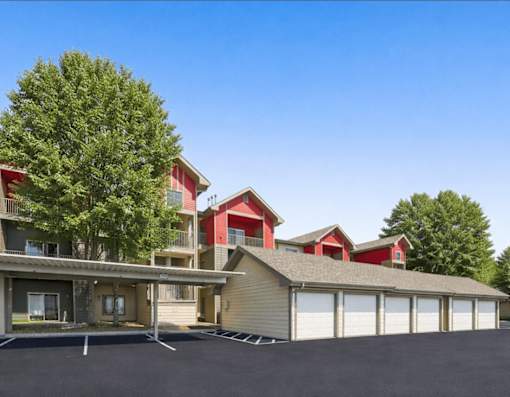 Multistory residential buildings with detached garages at Stetson Meadows Apartments, Colorado