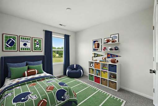 A bedroom with a football theme, including a bedspread, pillows, and decorations.
