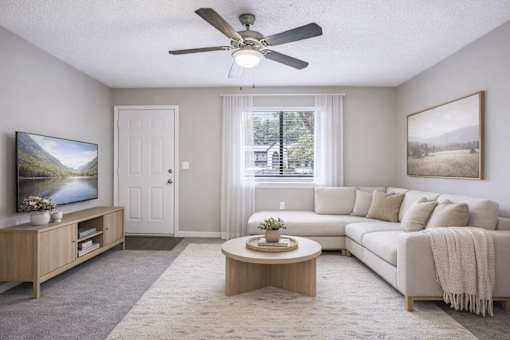 Spacious living room with modern furnishings at Davidson Homes Apartments, Concord, NC
