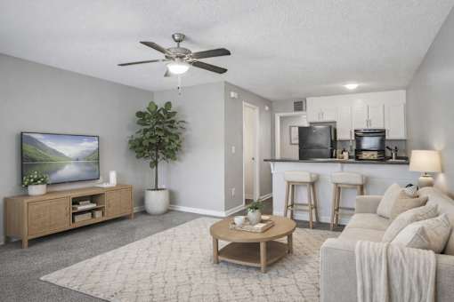 Open concept living area with kitchen bar at Davidson Homes Apartments, Concord, 28027