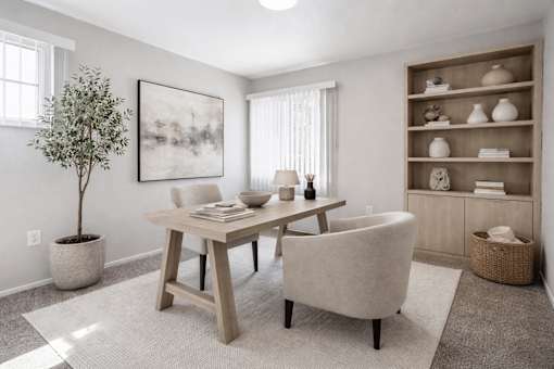 Home office with wooden desk and built in shelving at Vista Linda Apartments, Santa Fe, New Mexico