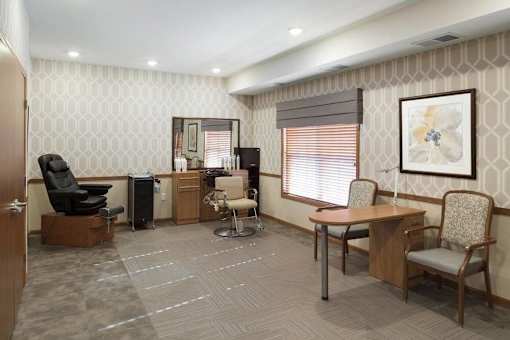 Salon and spa room with styling chair at The Estates at Arbor Oaks Apartments, Andover, MN