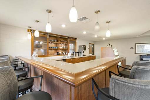 Community bistro bar with pendant lighting at The Estates at Arbor Oaks Apartments, Andover, 55304