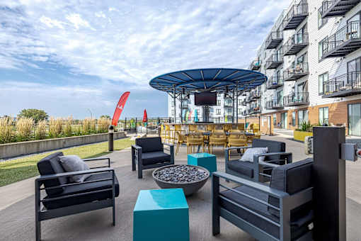 Rooftop terrace with firepit and outdoor seating at Hello Apartments, Minneapolis