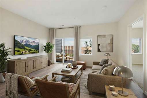 A living room with a large painting on the wall and a flat screen TV mounted above a wooden cabinet at Aster Meadow, Vadnais Heights, MN, 55127