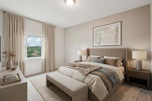 A bedroom with a large bed and a window with curtains at Aster Meadow, Vadnais Heights, MN, 55127