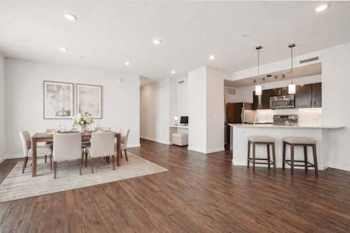 Open concept kitchen and dining area at Connect at First Creek Apartments, Colorado