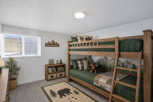 Bunk bedroom with mountain themed decor at Park Station Apartments, Midvale, UT 84047